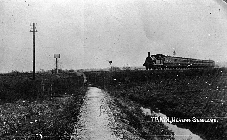 A passenger train c.1900 crossing Snodland marsh
